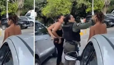 Imagem referente a Policial dá tapa no rosto de mãe suspeita de agredir a filha de 11 anos; veja vídeo