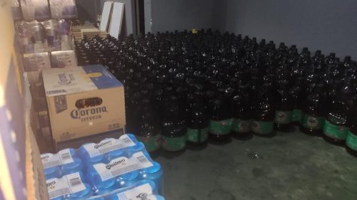 Imagem referente a Azeite, cerveja, energético; PF localiza barracão onde eram armazenados itens trazidos da Argentina