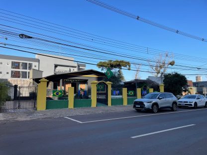 Imagem referente a O que é a casa verde e amarela que foi inaugurada em Cascavel?