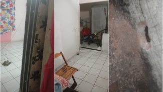 Morador do Santa Cruz precisa fazer buracos no muro para água sair de residência