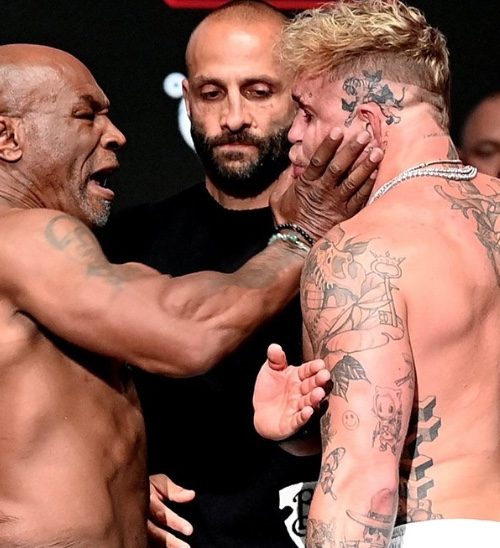 Imagem referente a Mike Tyson dá tapa na cara de Jake Paul, que esbraveja: ‘Ele deve morrer’