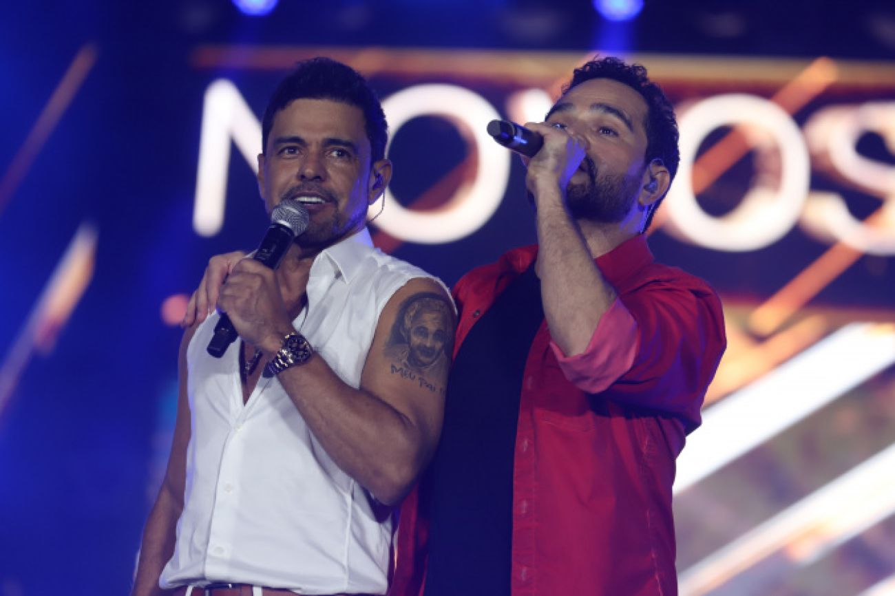 É o amor: 119 mil fãs de Zezé Di Camargo & Luciano cantam junto com a dupla em Matinhos Imagem referente a É o amor: 119 mil fãs de Zezé Di Camargo & Luciano cantam junto com a dupla em Matinhos