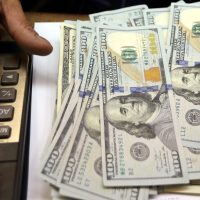 Imagem referente a Dólar sobe para R$ 5,91 com novas ameaças de Trump à China