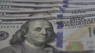 Dólar cai para R$ 5,40 após invasão à Venezuela