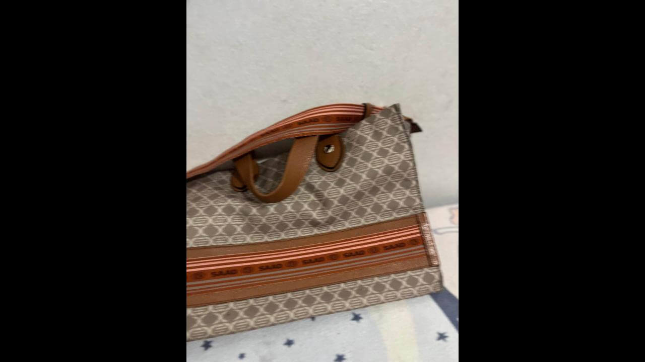 Foi perdido bolsa no bairro Centro Foi perdido bolsa no bairro Centro
