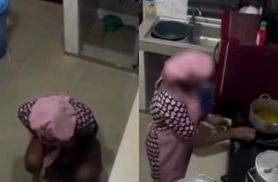 Mulher é flagrada urinando em panela para suposta "amarração" amorosa