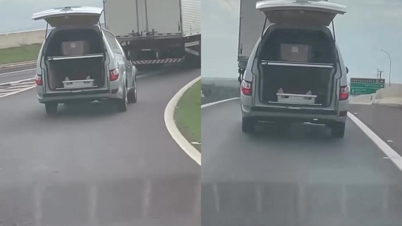 Carro funerário circula com tampa traseira aberta no Contorno Oeste; veja o vídeo