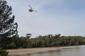 Helicóptero reforça buscas por Alex Budke Viana em lago no Reassentamento São Francisco