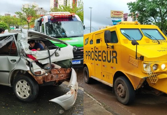 Carro-forte e automóvel se envolvem em colisão na Avenida Tancredo Neves