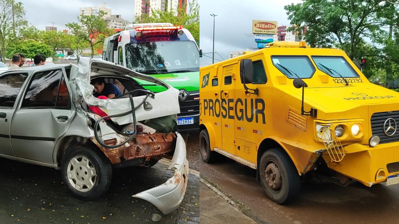 Carro-forte e automóvel se envolvem em colisão na Avenida Tancredo Neves