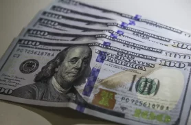 Dólar volta a R$ 5 com ambiente externo e ajuste pós-eleitoral