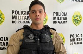 Criança encontrada sozinha no Universitário se agarra à perna de policial e recusa colo da mãe